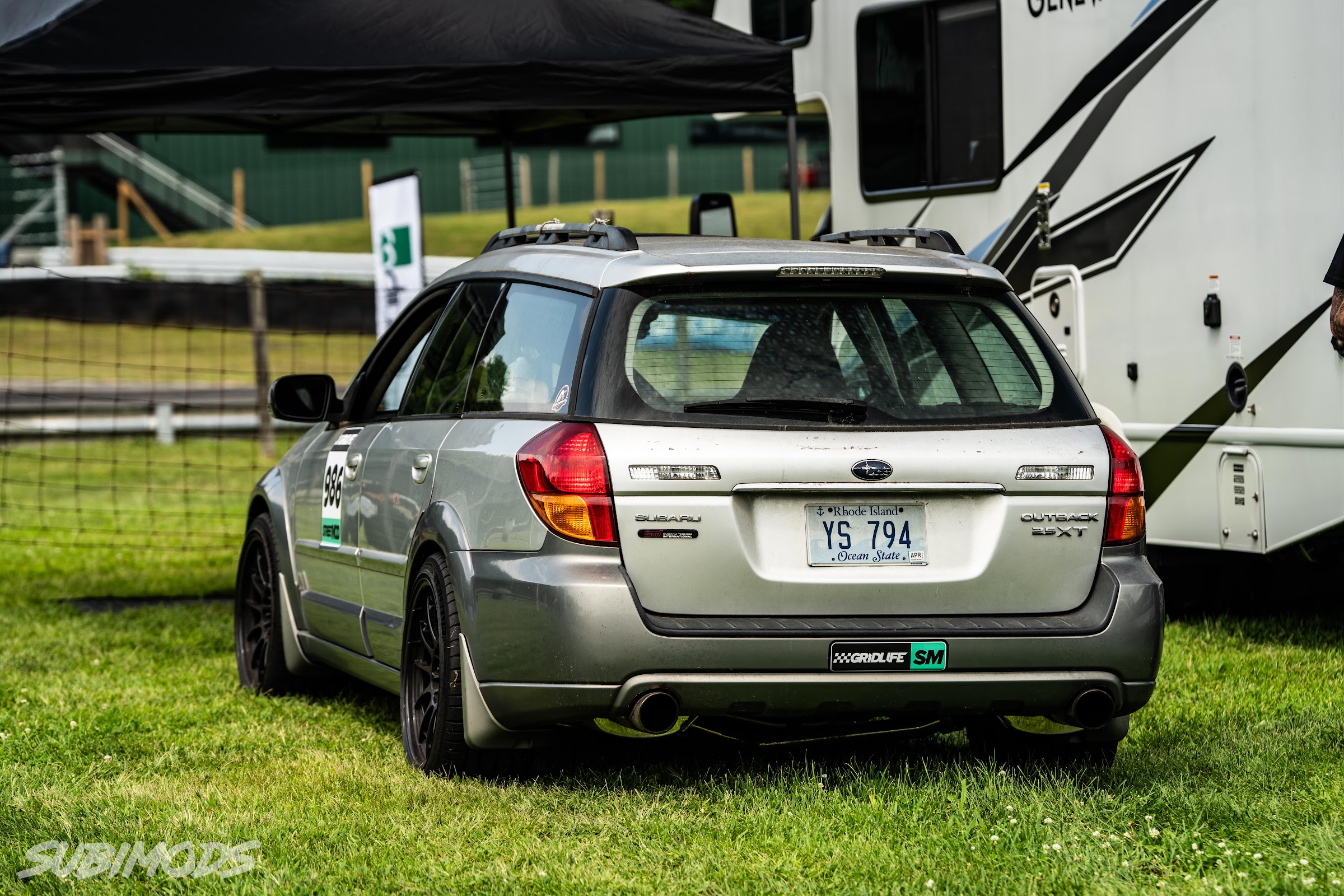 Track-prepped Subaru Outback wagon in the paddock